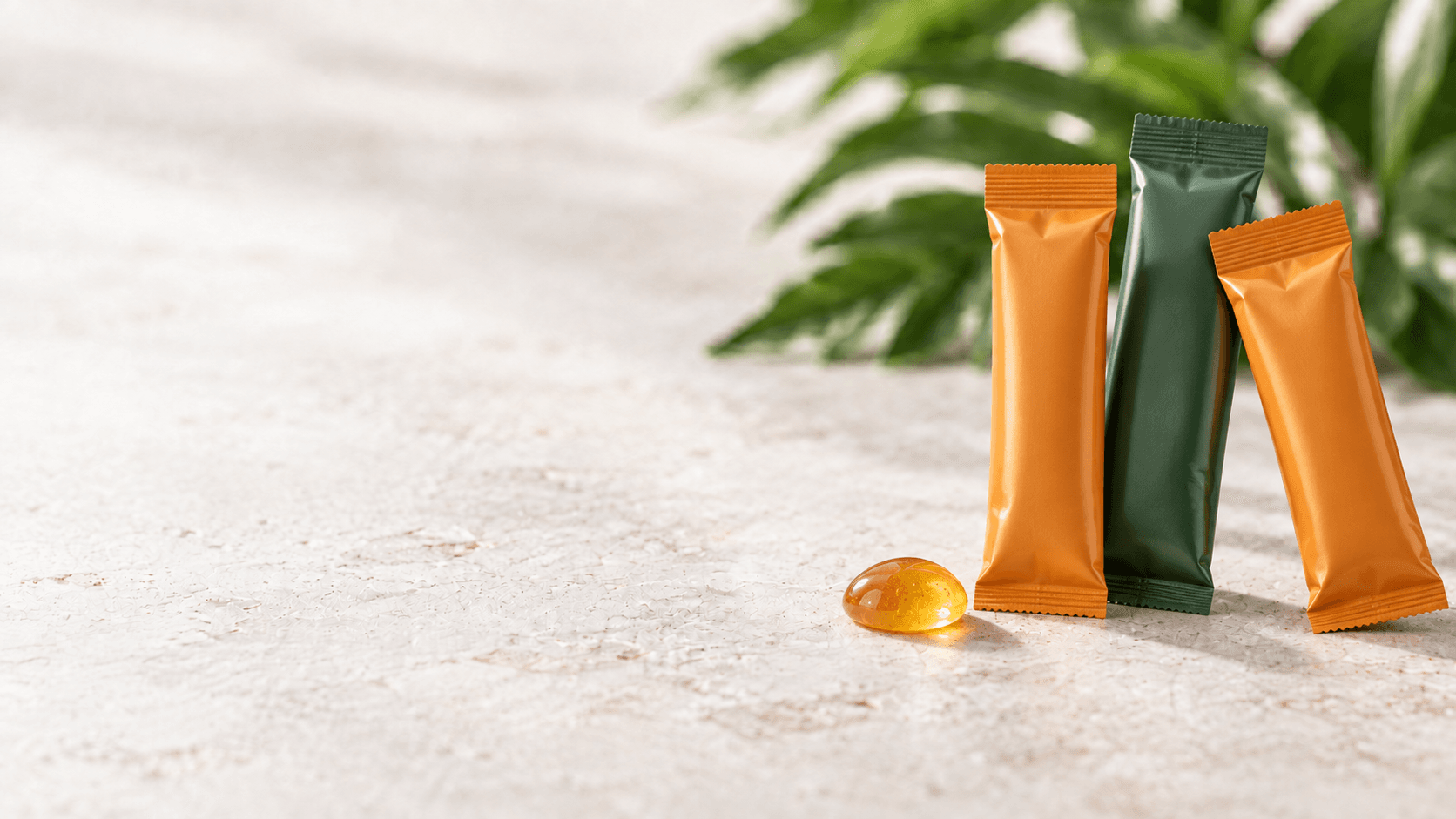 Single-serve energy gel sachets on a stone tabletop